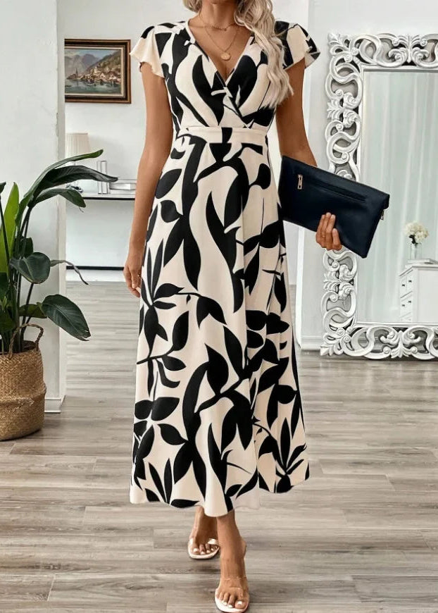 Vestido blanco y negro con escote en V y caída fluida