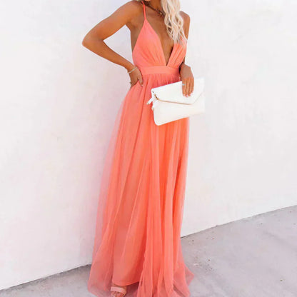 Rocío - Vestido maxi coral de escote profundo