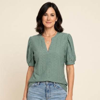 Lidia - Top calado con escote en V y mangas abullonadas