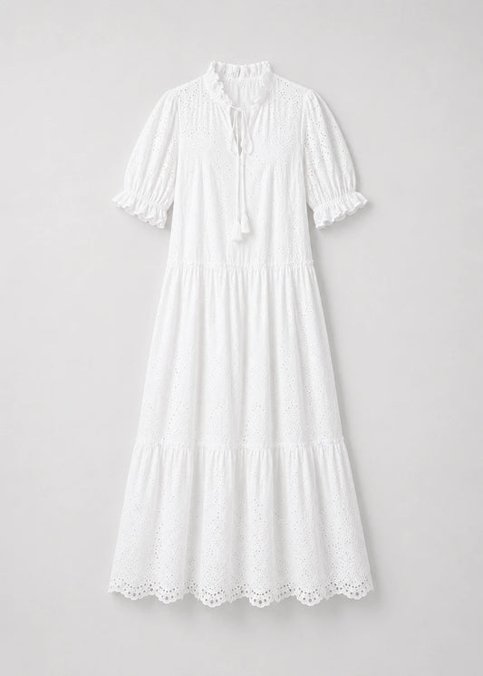 Vestido blanco bordado con lazo frontal