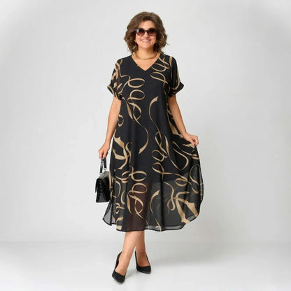 Francisca - Vestido con volante y estampado dorado