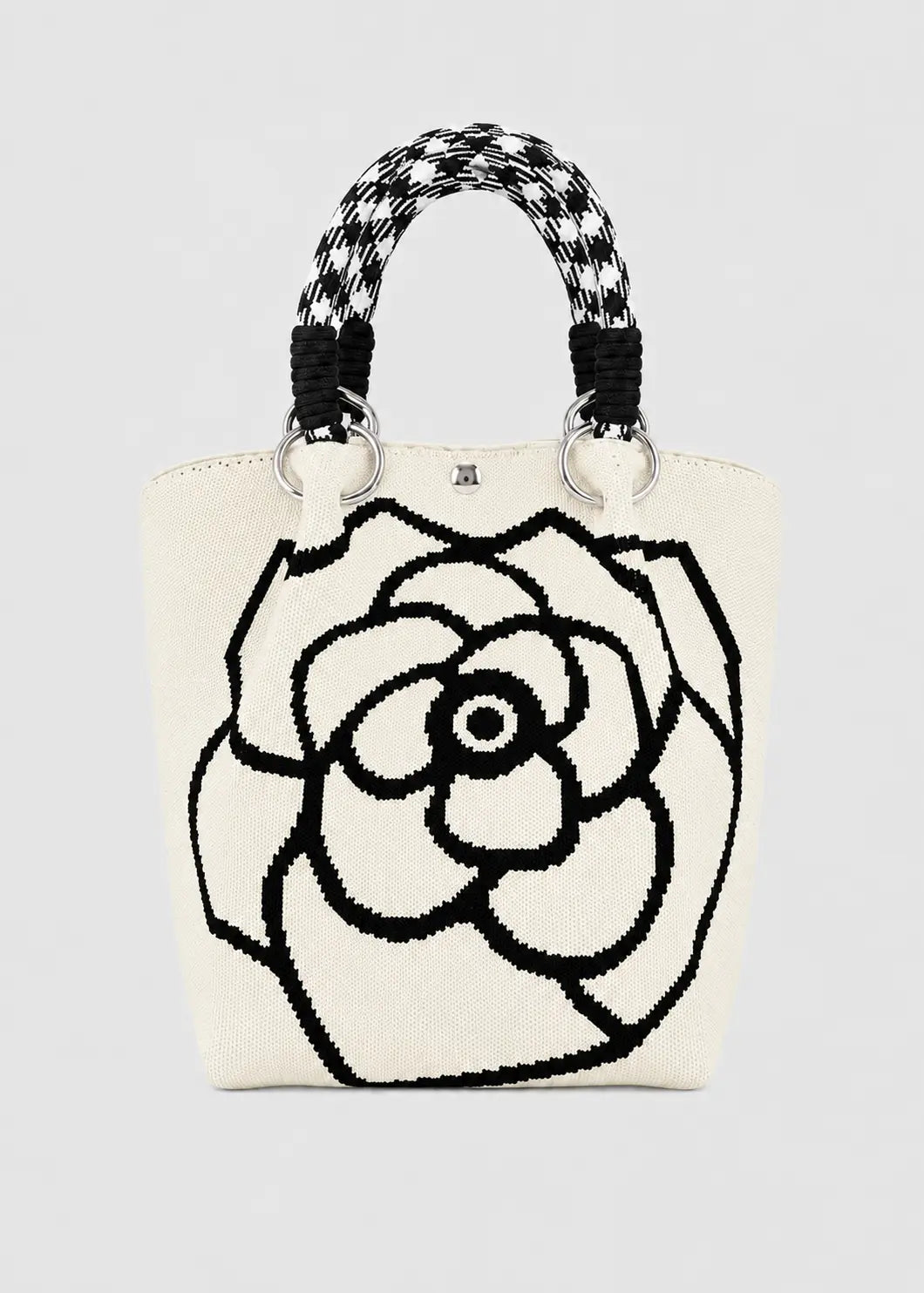 Bolso de mano tejido con estampado de flores
