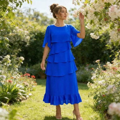 Raquel - Elegante vestido con mangas con volantes en capas